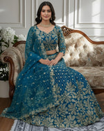Beautiful Turquoise Color Net Fabric Party Wear Lehenga