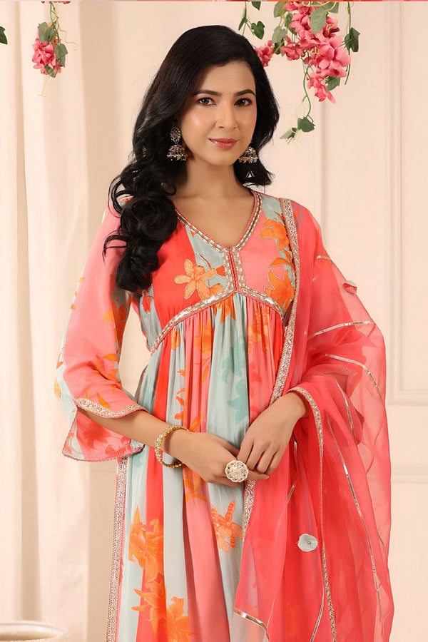 Tempting Orange Color Muslin Fabric Designer Suit