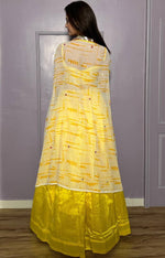 Striking Yellow Color Silk Fabric Party Wear Lehenga