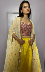 Striking Yellow Color Silk Fabric Party Wear Lehenga