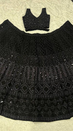 Pretty Black Color Net Fabric Party Wear Lehenga