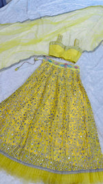 Pretty Yellow Color Georgette Fabric Party Wear Lehenga