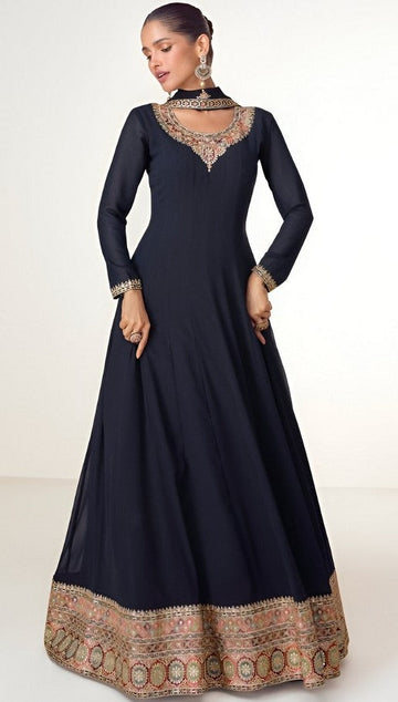 Tasteful Navy Blue Color Blooming Fabric Partywear Suit