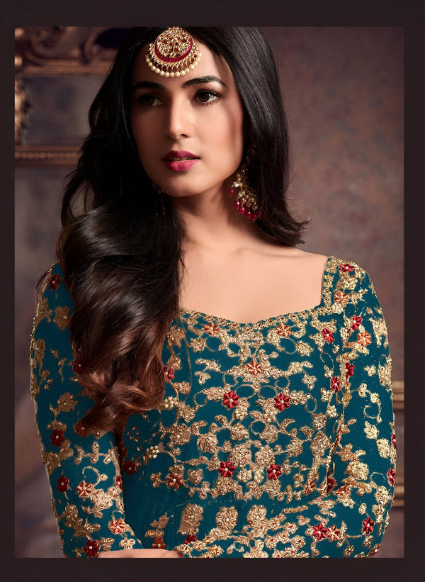 Graceful Teal Color Net Fabric Partywear Suit