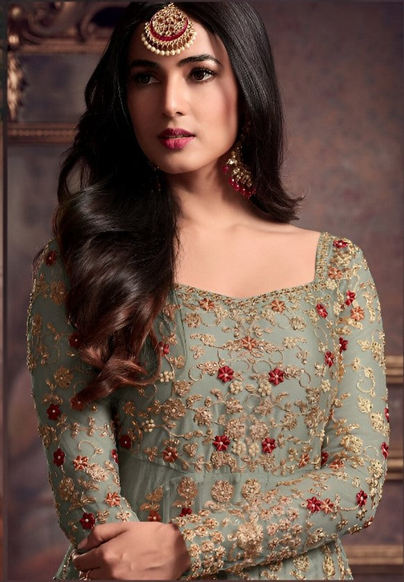 Graceful Green Color Net Fabric Partywear Suit