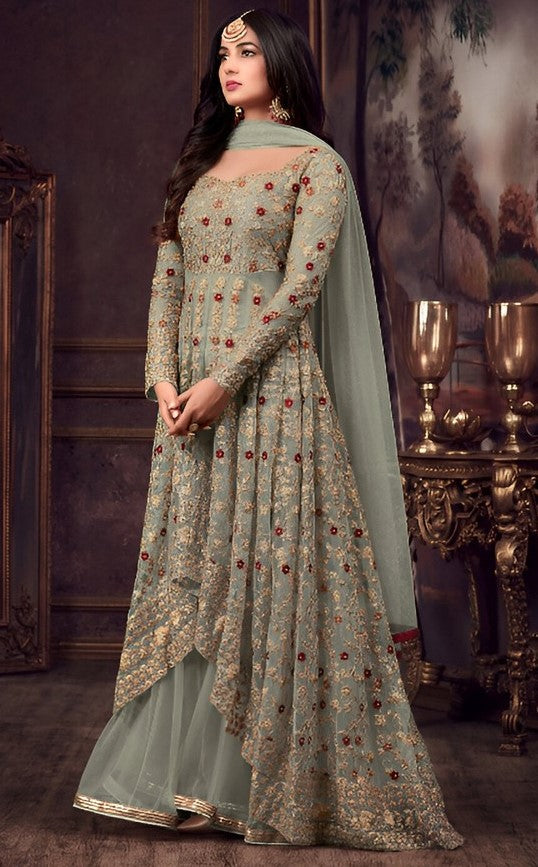 Graceful Green Color Net Fabric Partywear Suit