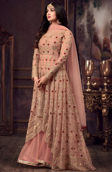 Graceful Peach Color Net Fabric Partywear Suit