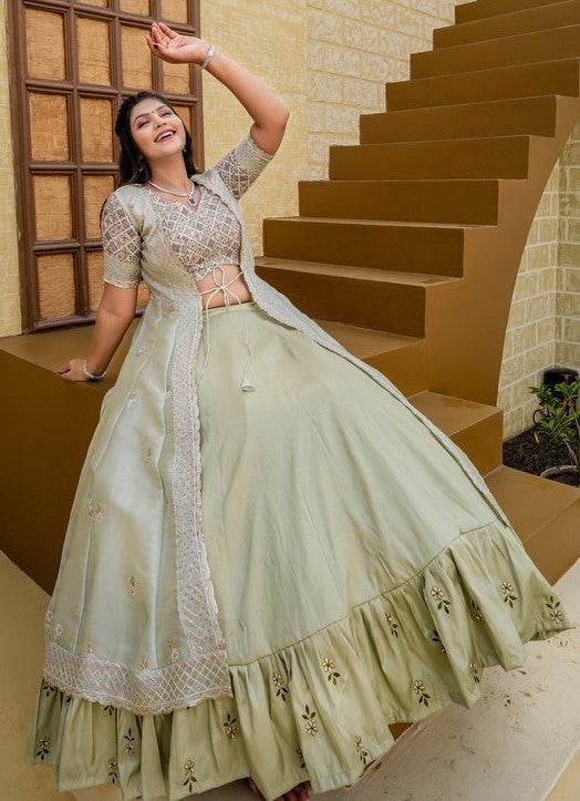 Dazzling Green Color Silk Fabric Party Wear Lehenga