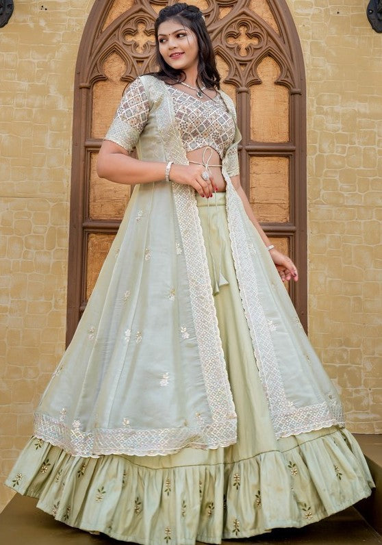 Dazzling Green Color Silk Fabric Party Wear Lehenga