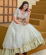 Dazzling Green Color Silk Fabric Party Wear Lehenga