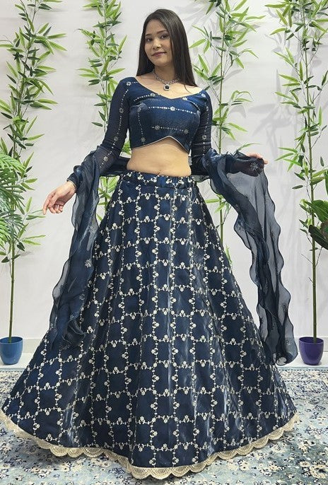 Dazzling Teal Color Jimmy Fabric Party Wear Lehenga