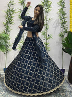 Dazzling Teal Color Jimmy Fabric Party Wear Lehenga