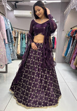 Dazzling Wine Color Jimmy Fabric Party Wear Lehenga