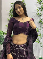 Dazzling Wine Color Jimmy Fabric Party Wear Lehenga
