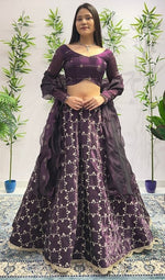 Dazzling Wine Color Jimmy Fabric Party Wear Lehenga