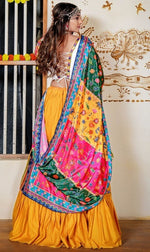 Dazzling Yellow Color Rayon  Fabric Party Wear Lehenga