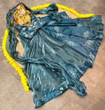Dazzling Teal Color Jimmy Fabric Party Wear Lehenga