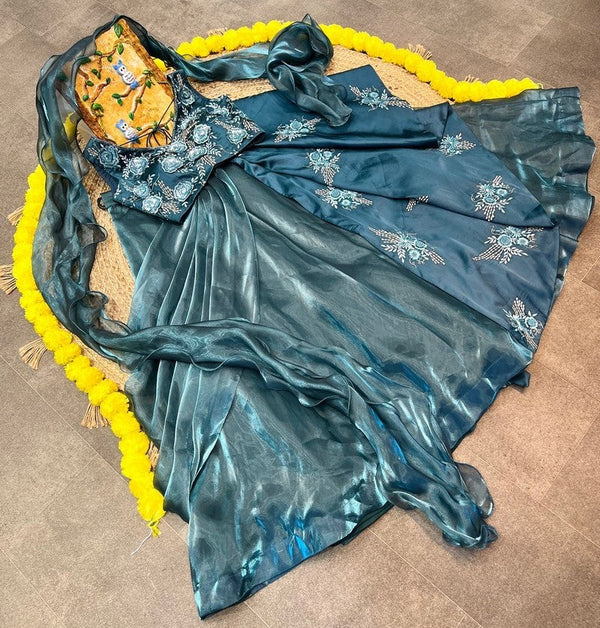 Dazzling Teal Color Jimmy Fabric Party Wear Lehenga