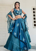 Dazzling Teal Color Jimmy Fabric Party Wear Lehenga