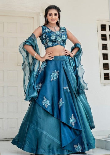 Dazzling Teal Color Jimmy Fabric Party Wear Lehenga