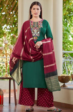 Lovely Green Color Rayon Fabric Casual Suit
