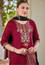Lovely Maroon Color Rayon Fabric Casual Suit