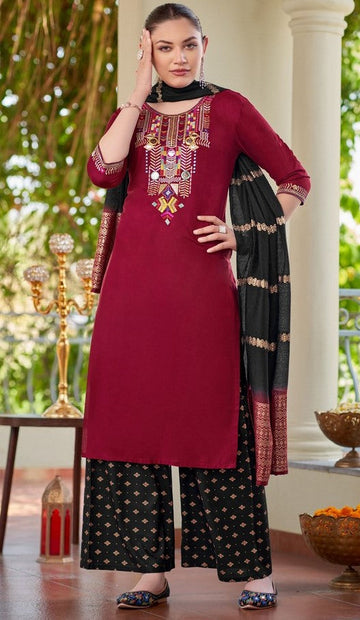 Lovely Maroon Color Rayon Fabric Casual Suit
