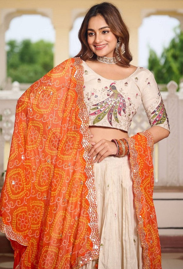 Impressive Cream Color Tissue Fabric Party Wear Lehenga