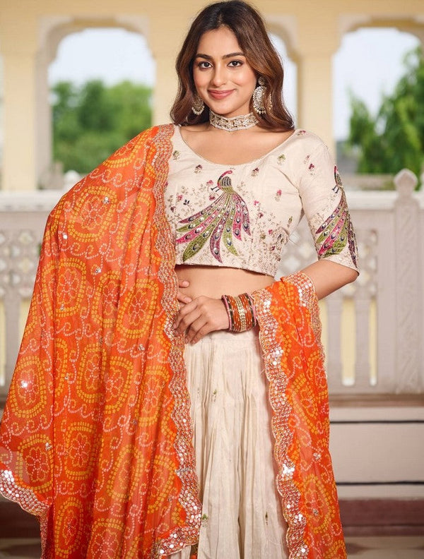 Impressive Cream Color Tissue Fabric Party Wear Lehenga