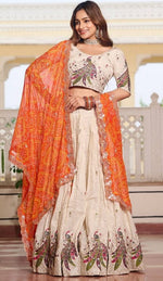 Impressive Cream Color Tissue Fabric Party Wear Lehenga