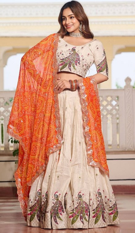 Impressive Cream Color Tissue Fabric Party Wear Lehenga