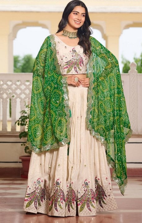 Impressive Cream Color Tissue Fabric Party Wear Lehenga