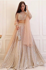 Magnetic Peach Color Satin Fabric Party Wear Lehenga