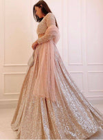Magnetic Peach Color Satin Fabric Party Wear Lehenga