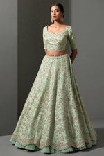 Magnetic Green Color Silk Fabric Party Wear Lehenga