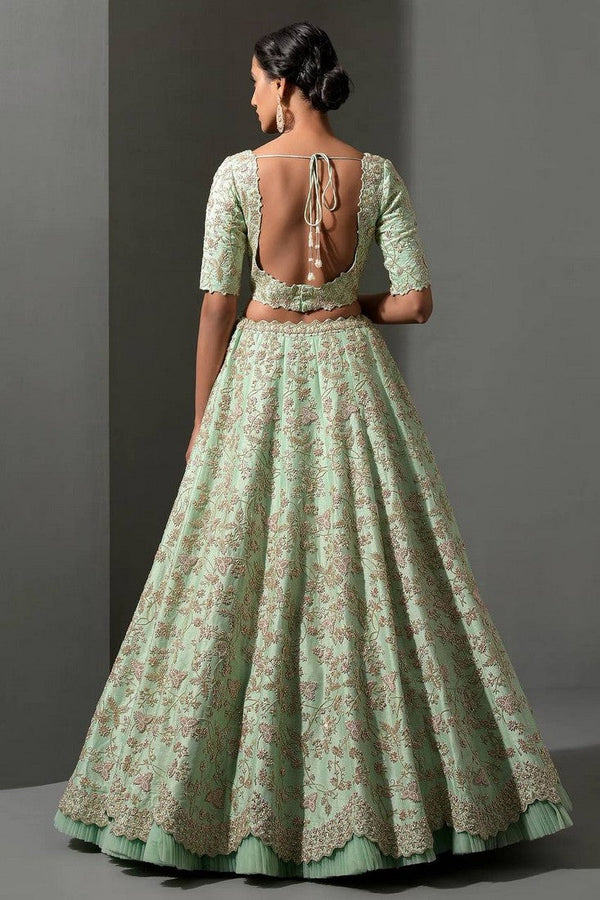 Magnetic Green Color Silk Fabric Party Wear Lehenga