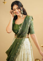 Magnetic Cream Color Crepe Fabric Party Wear Lehenga