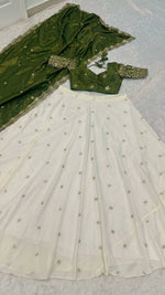 Magnetic Cream Color Crepe Fabric Party Wear Lehenga
