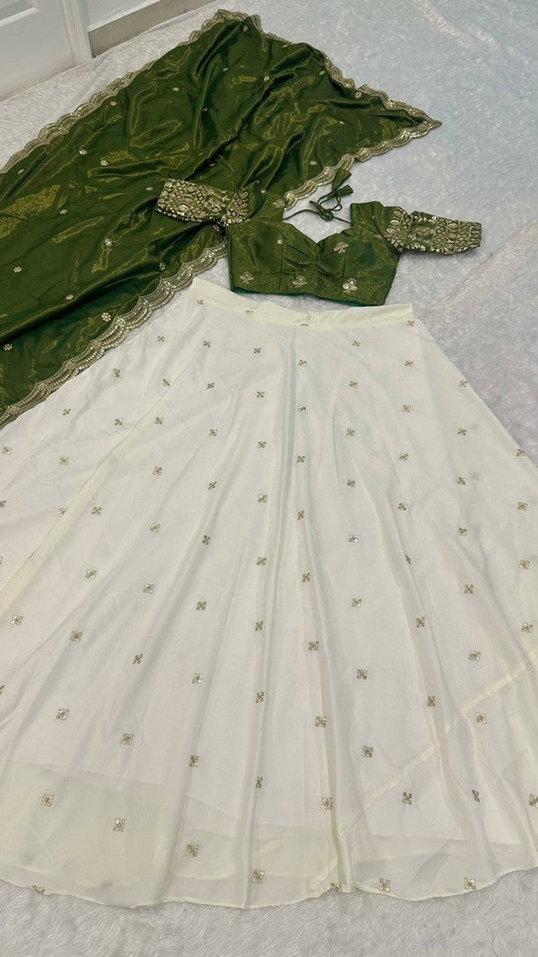 Magnetic Cream Color Crepe Fabric Party Wear Lehenga