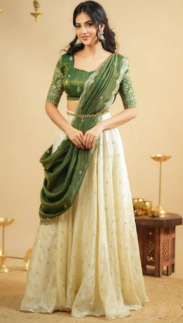 Magnetic Cream Color Crepe Fabric Party Wear Lehenga