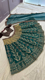 Amazing Green Color Silk Fabric Party Wear Lehenga