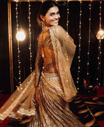 Pretty Golden Color Silk Fabric Party Wear Lehenga
