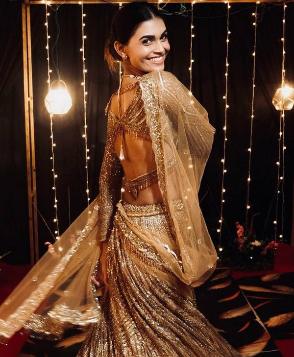 Pretty Golden Color Silk Fabric Party Wear Lehenga