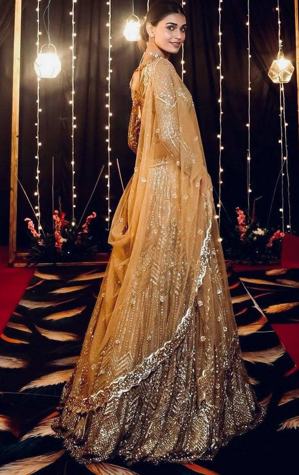 Pretty Golden Color Silk Fabric Party Wear Lehenga