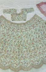 Pretty Green Color Silk Fabric Party Wear Lehenga