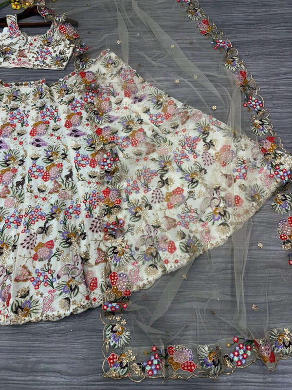 Charming Cream Color Georgette Fabric Party Wear Lehenga