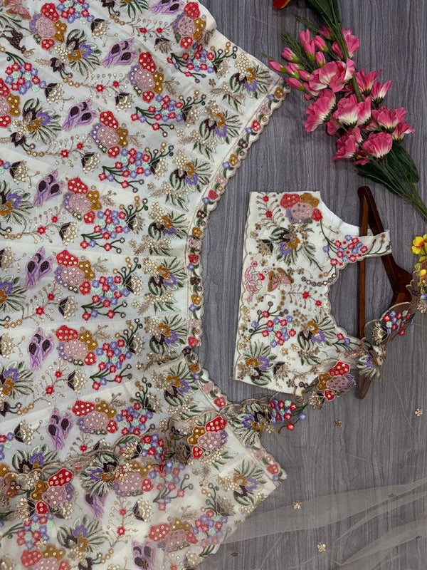 Charming Cream Color Georgette Fabric Party Wear Lehenga