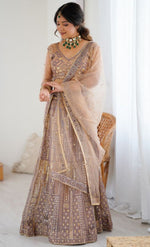 Angelic Peach Color Net Fabric Party Wear Lehenga