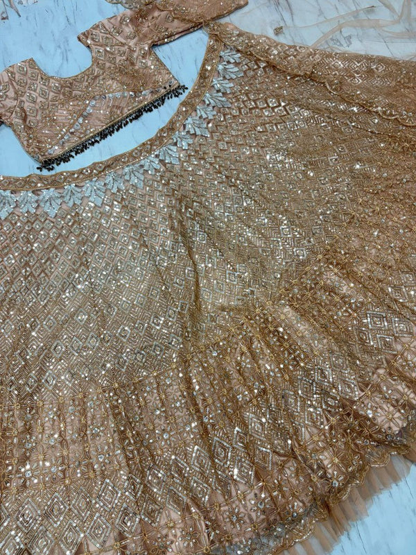 Glowing Golden Color Net Fabric Wedding Lehenga
