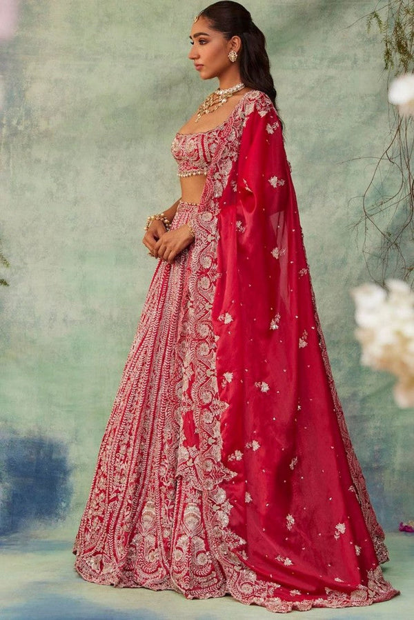 Desirable Red Color Silk  Fabric Wedding Lehenga